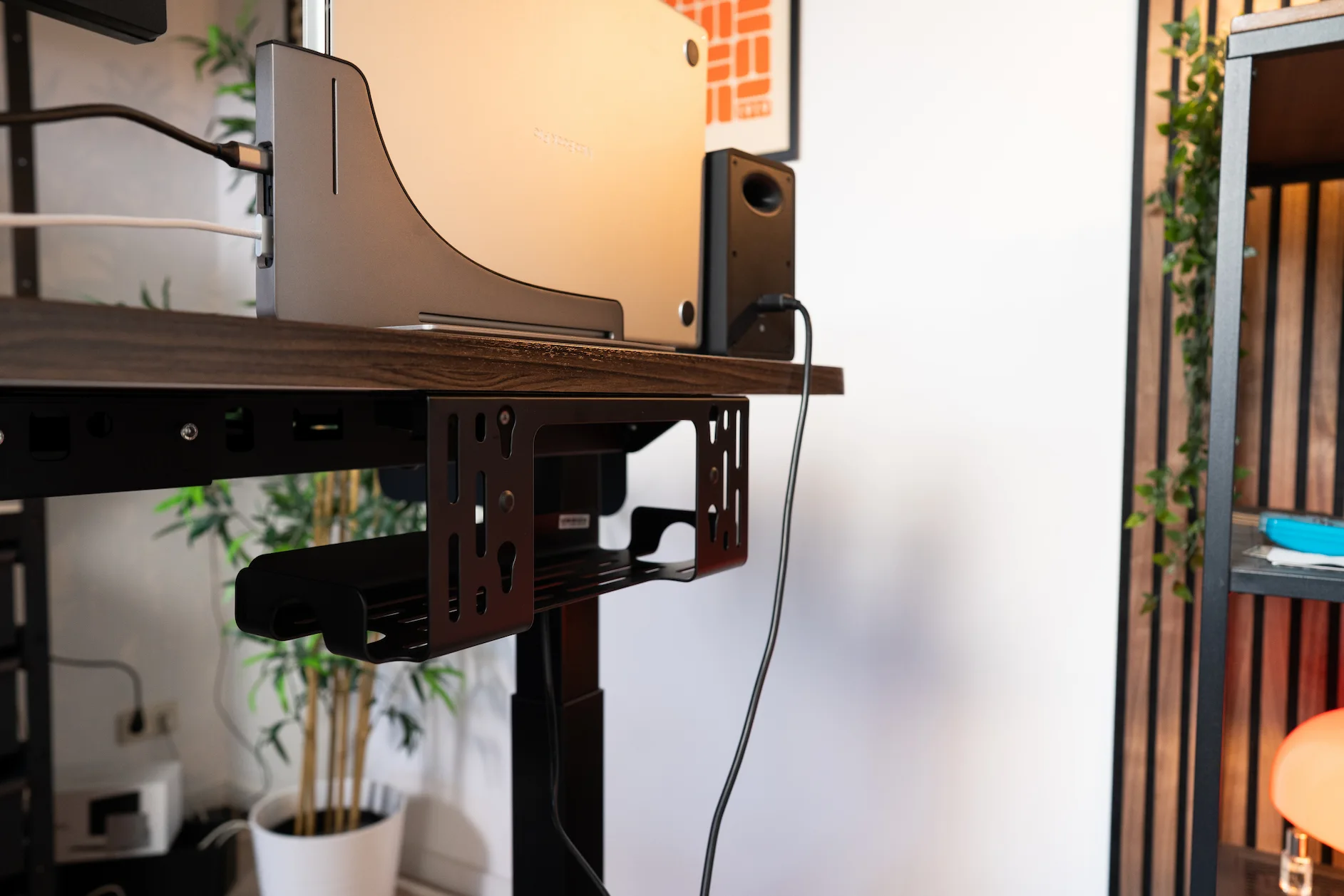 Side-mounted DivMag Cable Management Tray installed under the desk Side-mounted DivMag Cable Management Tray installed under the desk